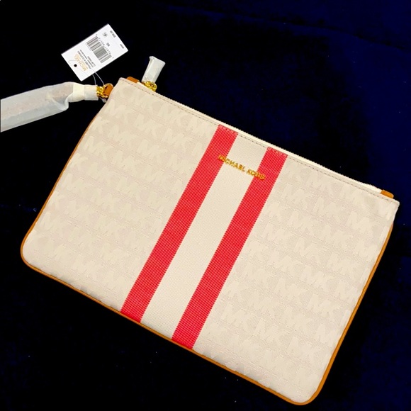 Michael Kors Handbags - Michael kors large zip pouches /cluches